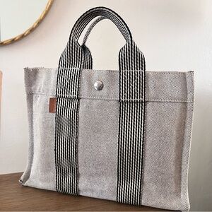 Sold Out 
Hermes Gray and Black Tote Bag